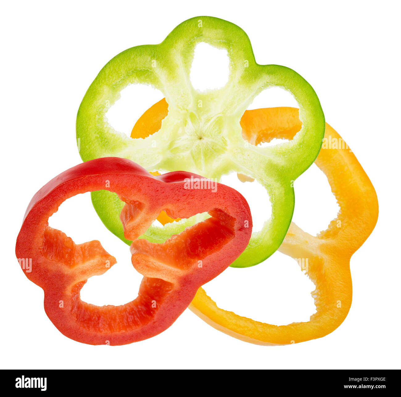 rot, gelb und grün Pfeffer Scheiben auf dem weißen Hintergrund isoliert. Stockfoto