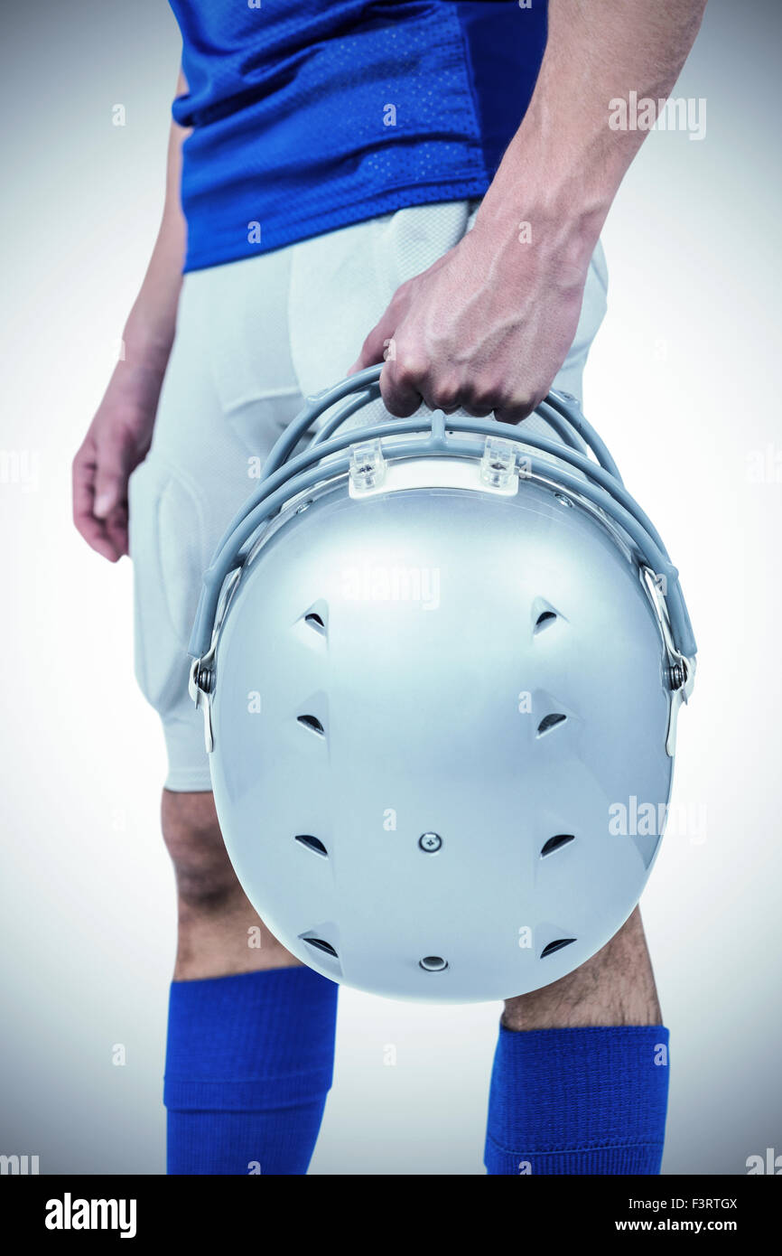 Übergabe seiner Helm-Sportler Stockfoto