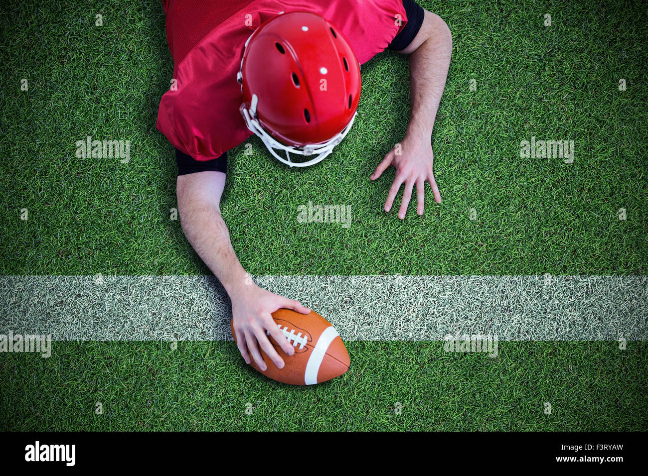 Zusammengesetztes Bild der amerikanischen Football-Spieler versuchen, Gäste Stockfoto
