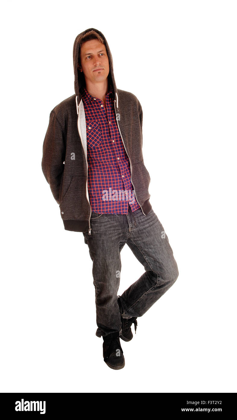 Ein Ganzkörper-Bild ein hübscher junger Mann in einen Pulli und Jeans, für weißen Hintergrund isoliert. Stockfoto