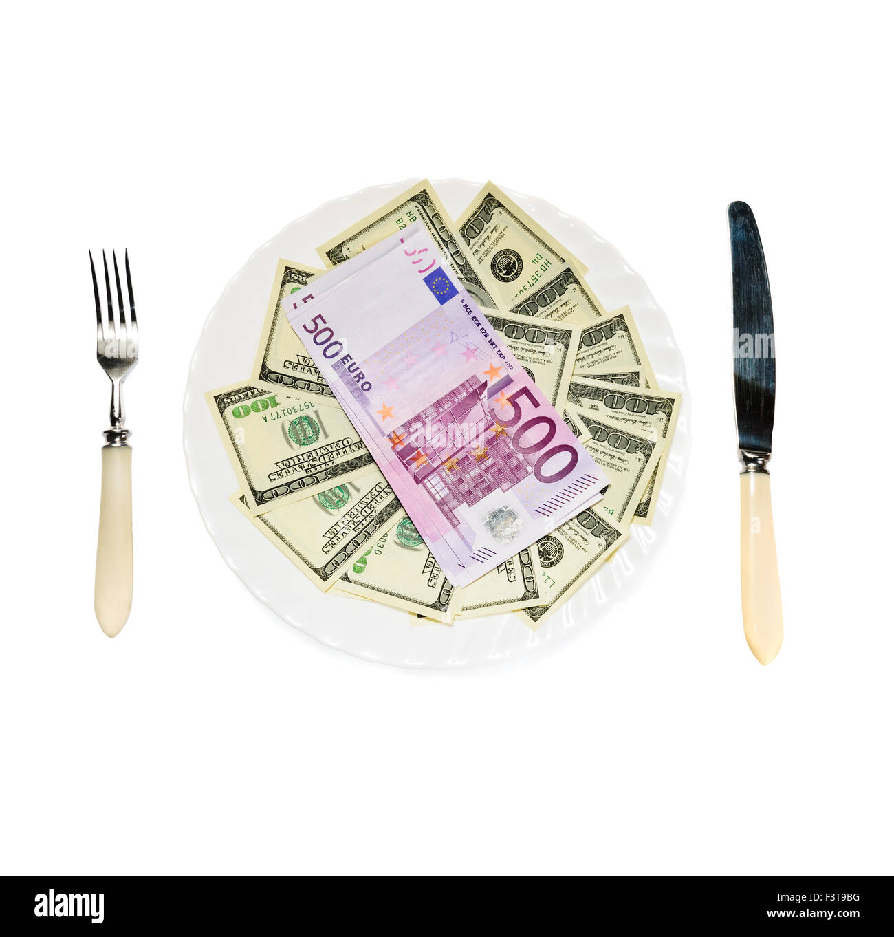 Geld auf Platte isoliert auf weißem Hintergrund Stockfoto