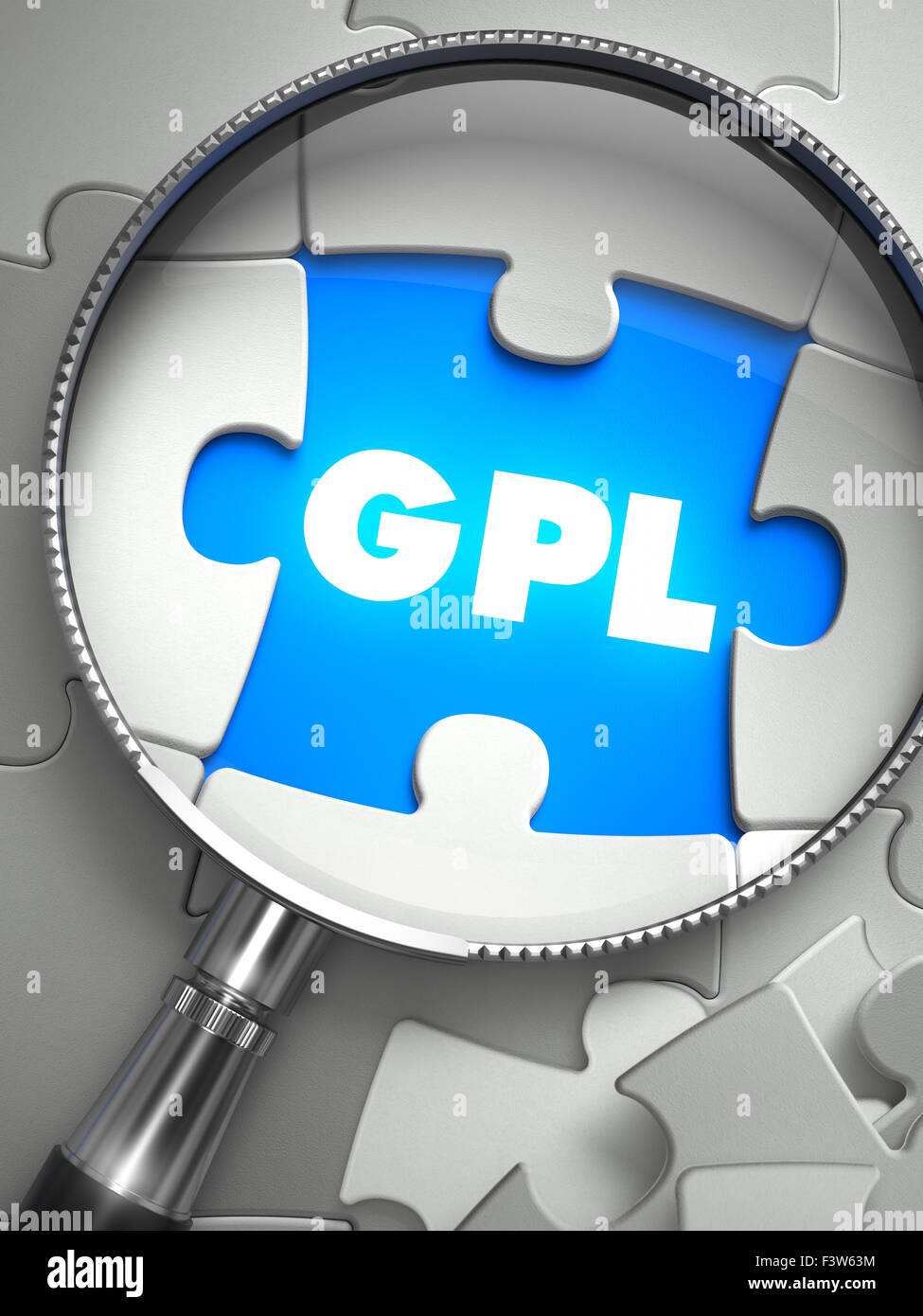 GPL - General Public License - Wort an der Stelle der fehlenden Puzzleteil durch Lupe. Selektiven Fokus. Stockfoto