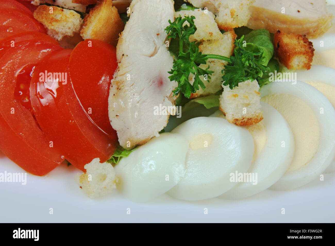 Salat von Wurst und Schinken Stockfoto