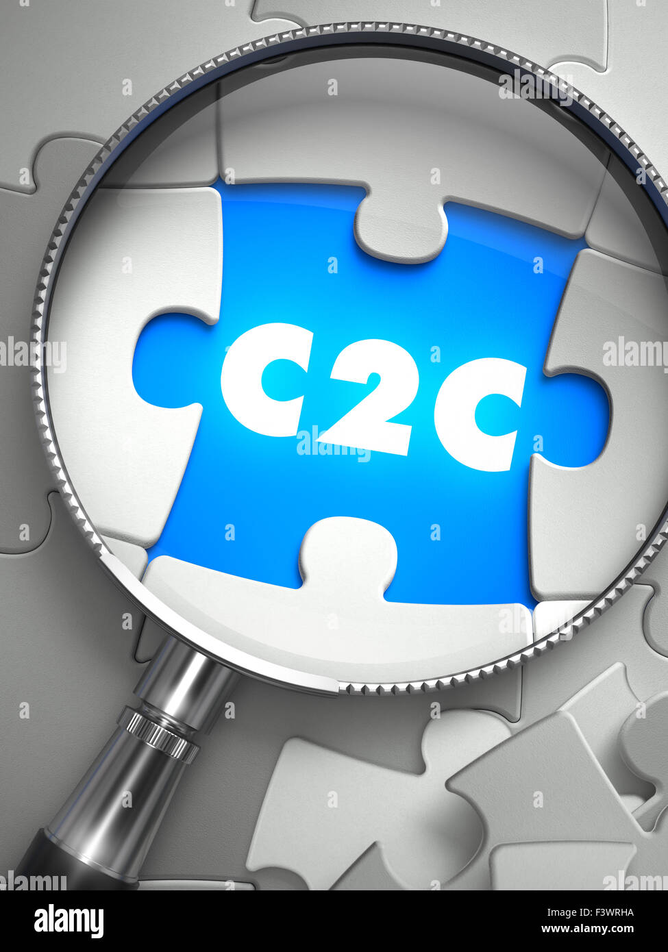 C2C - Puzzle mit fehlenden Stück durch Lupe. Stockfoto