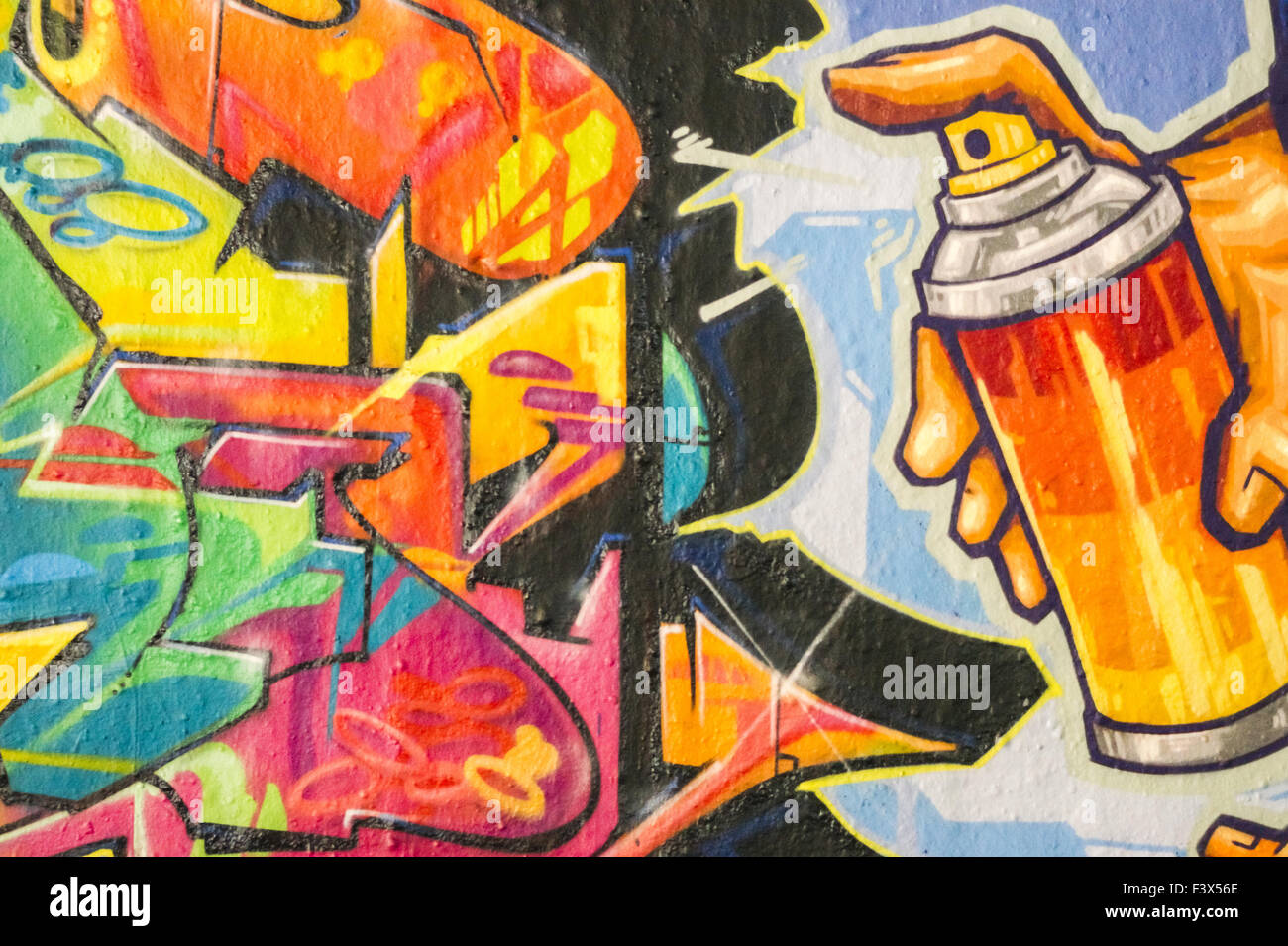 Hand mit einer Sprühdose Graffito Stockfoto