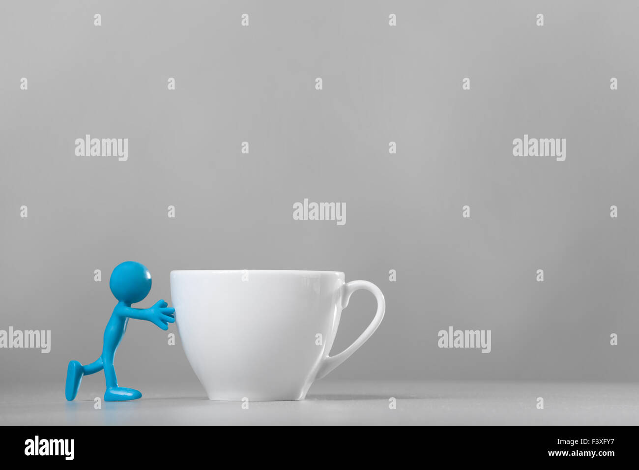 Blue Man drücken und Kaffeetasse. Stockfoto
