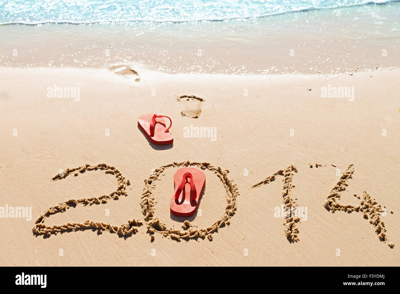 Roten Flip-Flops am Strand Stockfoto