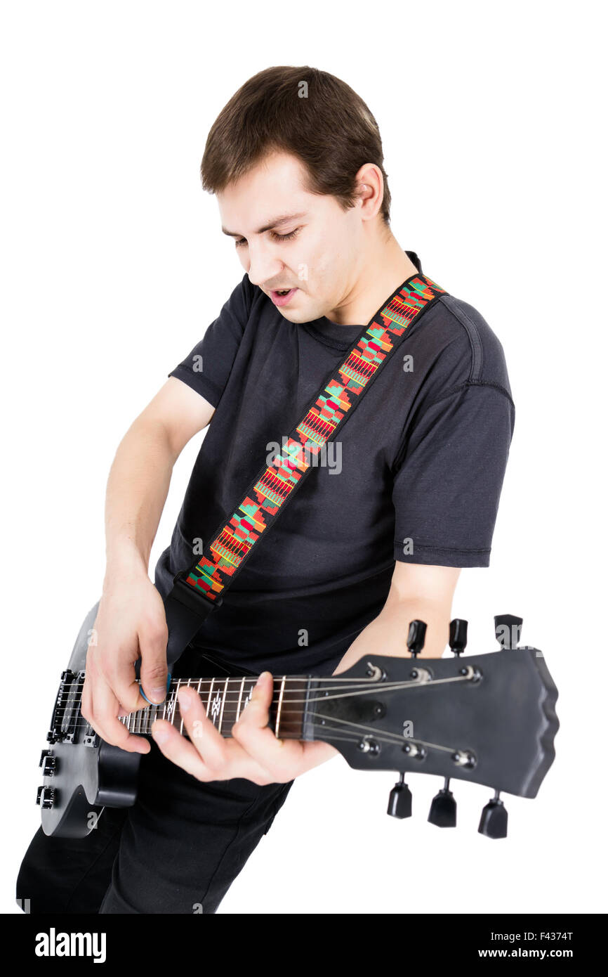 junger Mann mit einer e-Gitarre. Isoliert Stockfoto