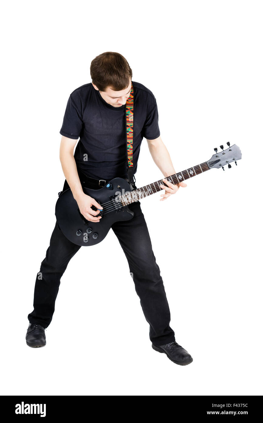 junger Mann mit einer e-Gitarre. Isoliert Stockfoto