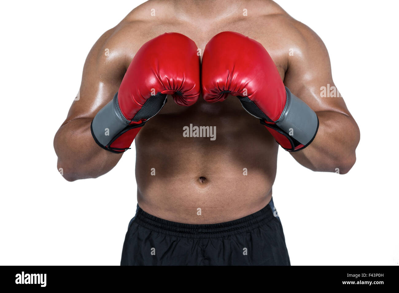 Muskulöser Mann Boxen in Handschuhe Stockfoto