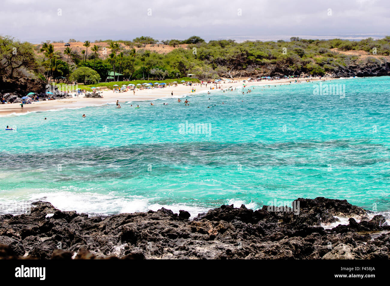 Touristen genießen Sie weltberühmte Hapuna Beach, Kohala Coast, Hawaii, USA Stockfoto