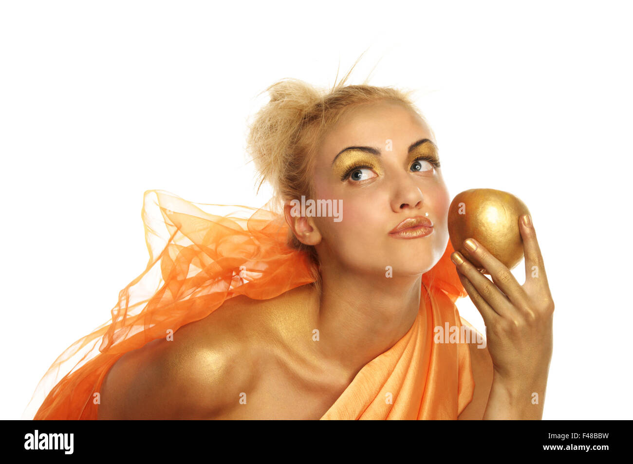 Schöne Frau mit goldenen Apfel Stockfoto