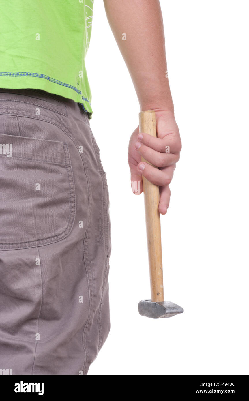 Teenager hält einen hammer Stockfoto