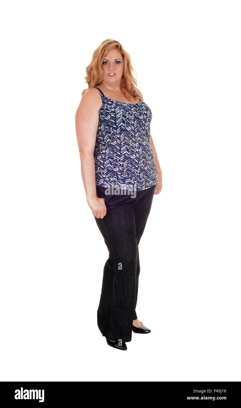 Plus Size Frau stehend in Jeans. Stockfoto