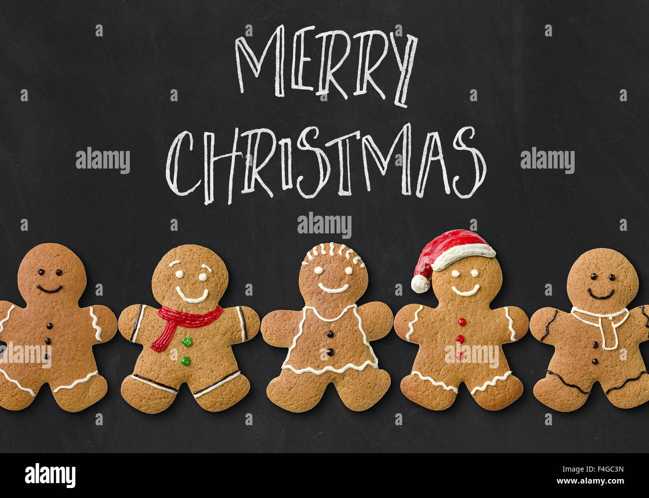 Weihnachtskarte mit Lebkuchenmänner Stockfoto