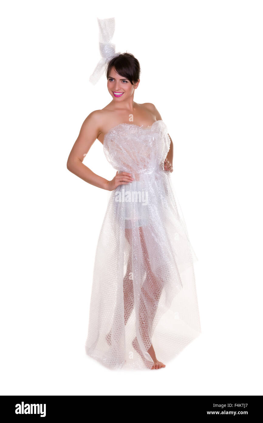 Lustiges Foto einer jungen Frau mit nichts zu tragen aber Abfallstoffe - Dies ist Teil einer Serie mit Jute-Tasche, WC-Papier... Stockfoto