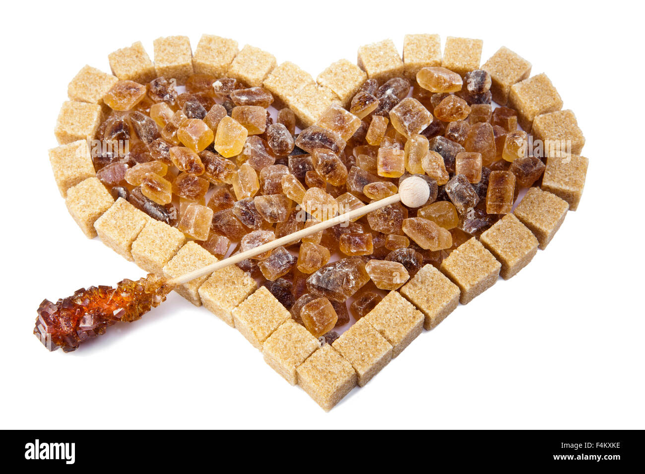 Herzen von nicht raffinierten Reed Zucker und Süßigkeiten auf einem stick Stockfoto