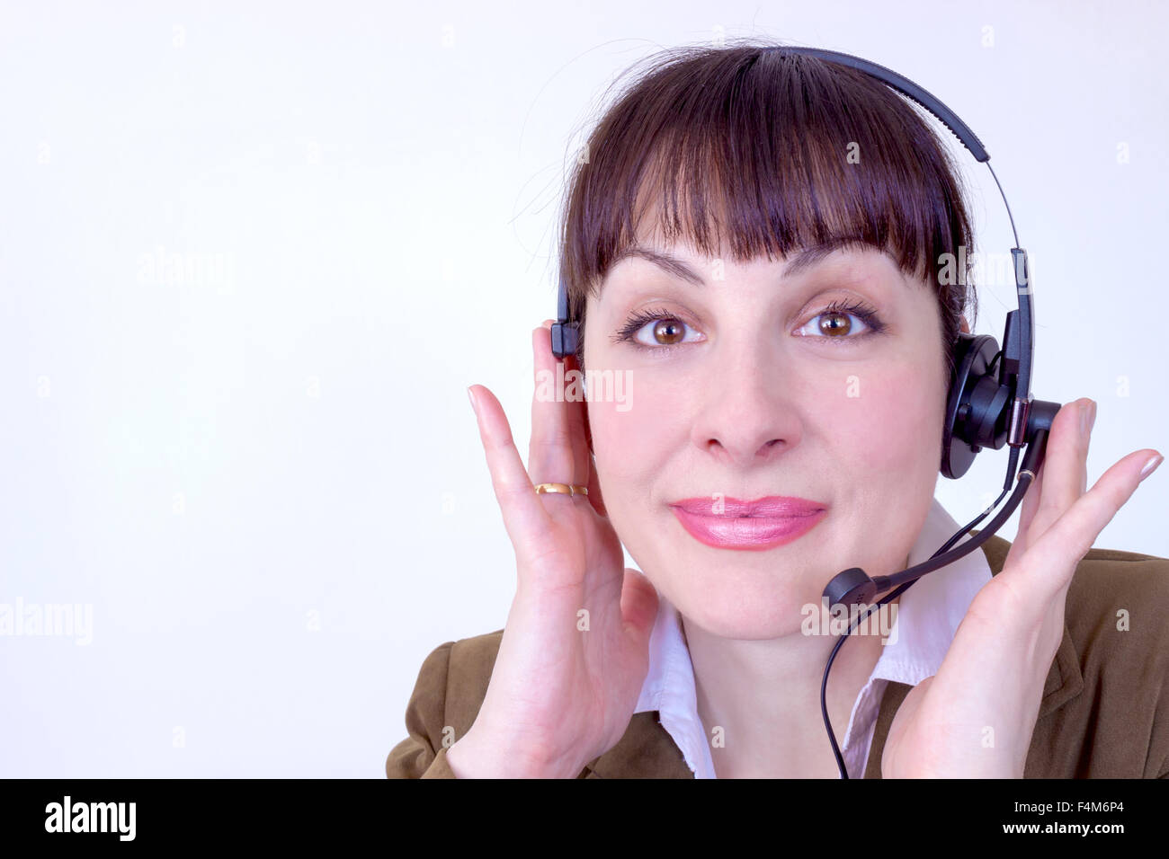 Porträt der schönen Call Center-Betreiber bei der Arbeit Stockfoto