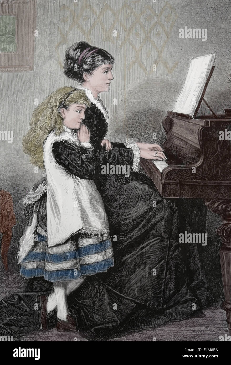 Klaviermusik-Lektion. Mutter und Kind Klavier zu spielen. Gravur. des 19. Jahrhunderts. Farbe. Stockfoto
