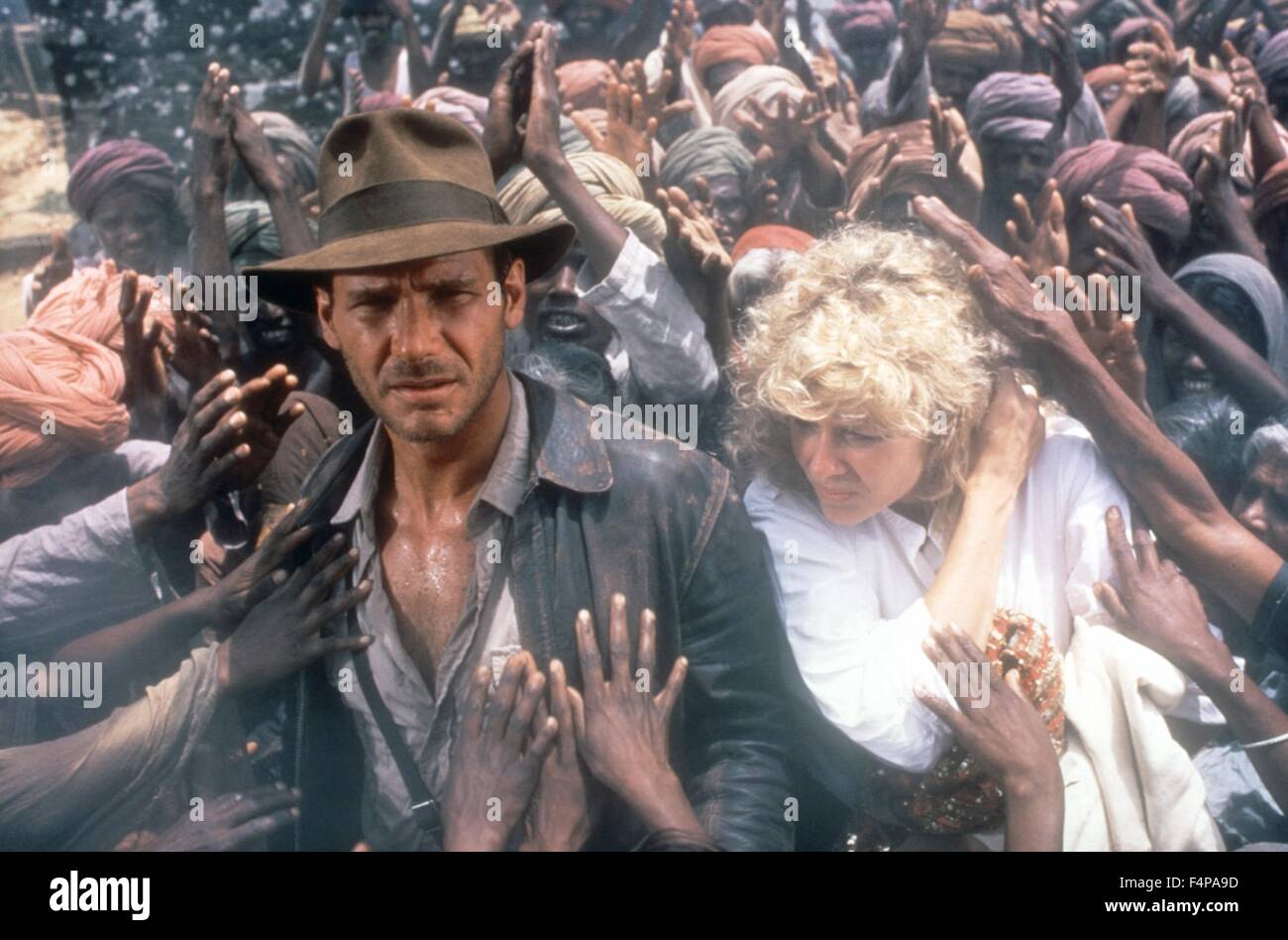 Harrison Ford, Kate Capshaw / Indiana Jones und der Tempel des Doom 1984 unter der Regie von Steven Spielberg Stockfoto