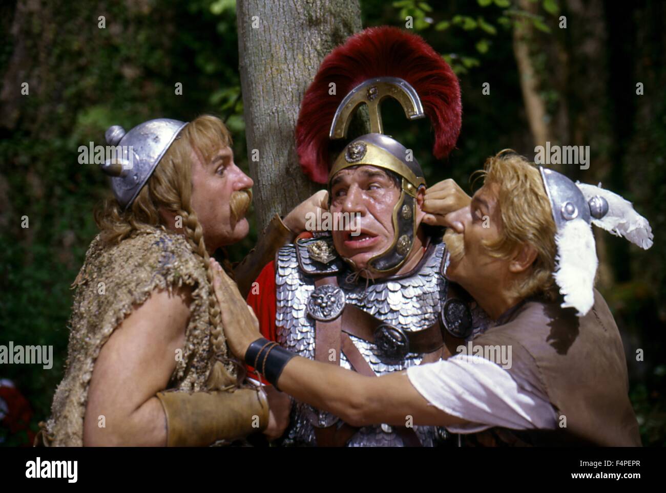 Gerard Depardieu (Obelix), Jean-Pierre Castaldi (Caius Bonus) und Christian Clavier (Asterix) / Asterix und Obelix auf Caesar / 1999 unter der Regie von Claude Zidi Stockfoto