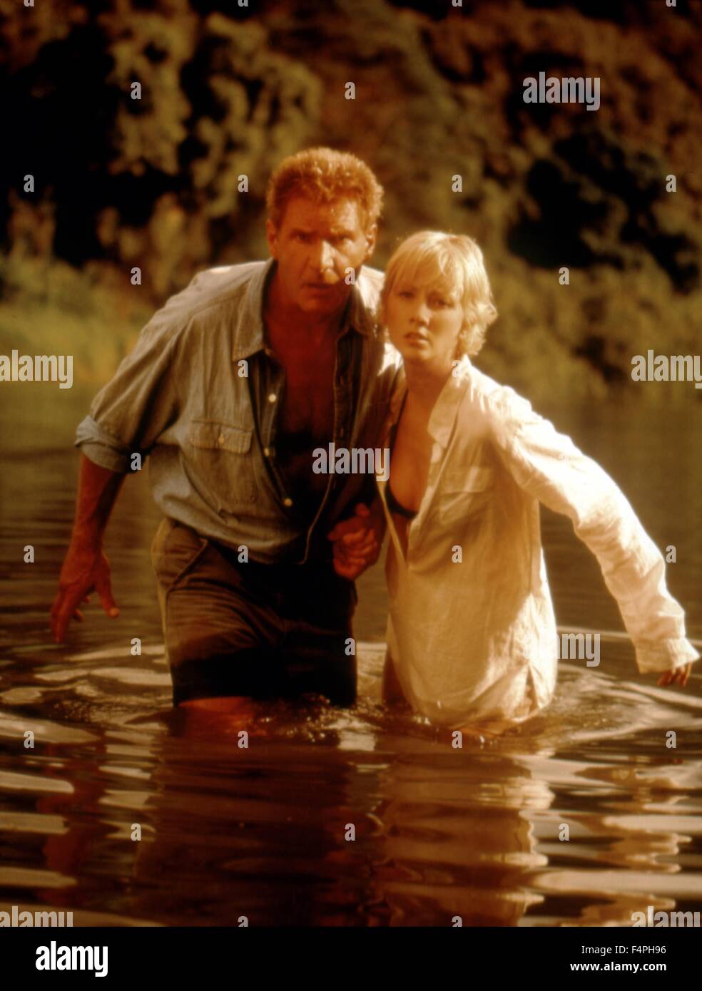 Harrison Ford und Anne Heche / sechs Tage, sieben Nächte / 1998 unter der Regie von Ivan Reitman Stockfoto