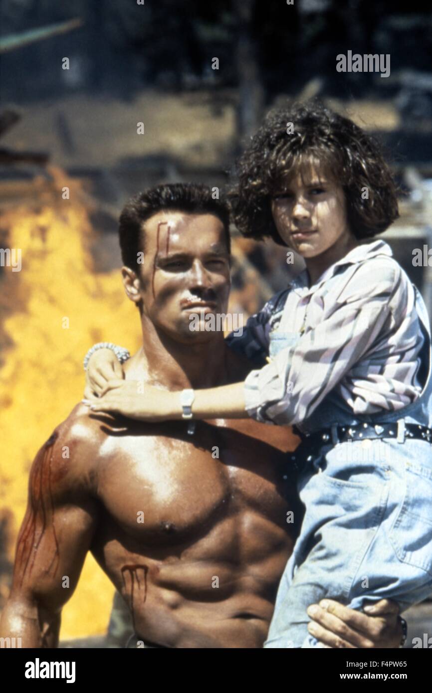 Arnold Schwarzenegger und Alyssa Milano / Commando / 1985 unter der Regie von Mark [zwanzigsten Jahrhundert Fox Film Corpo] Stockfoto