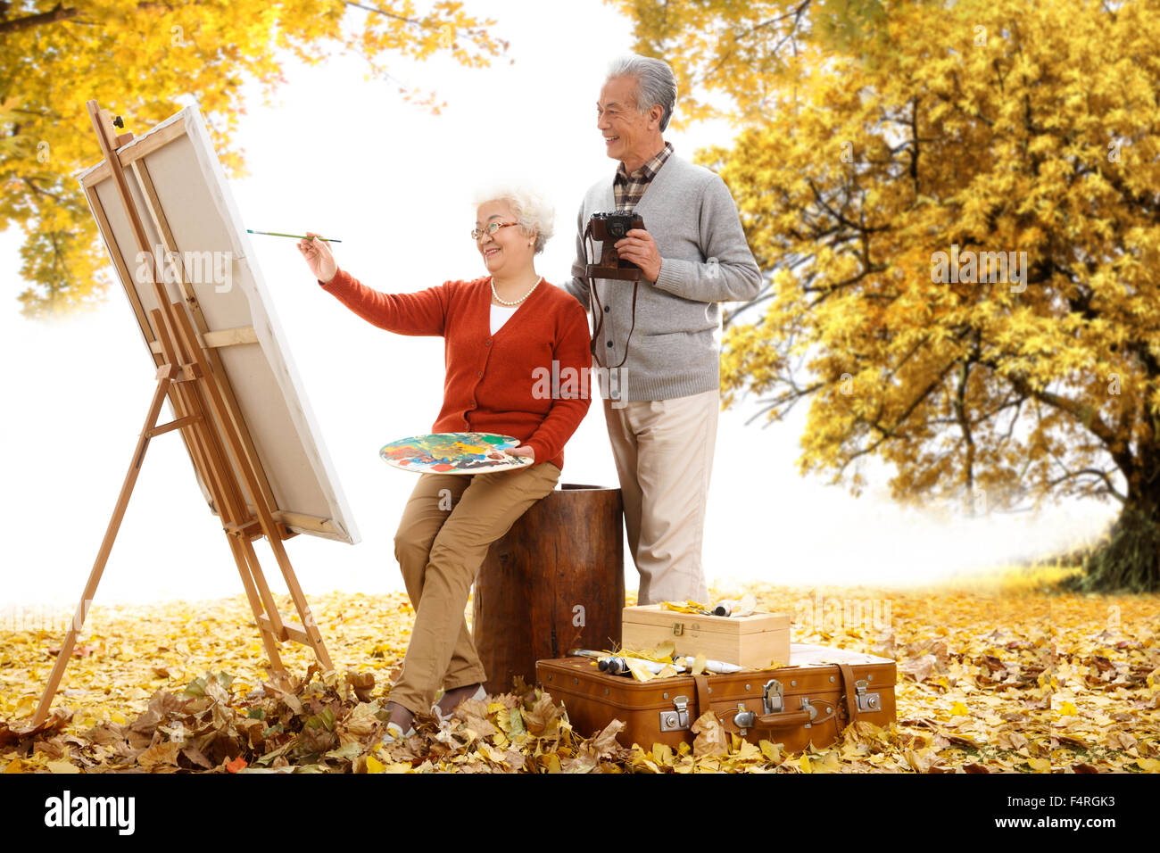 Glückliche alte paar in der Outdoor-Malerei Stockfoto