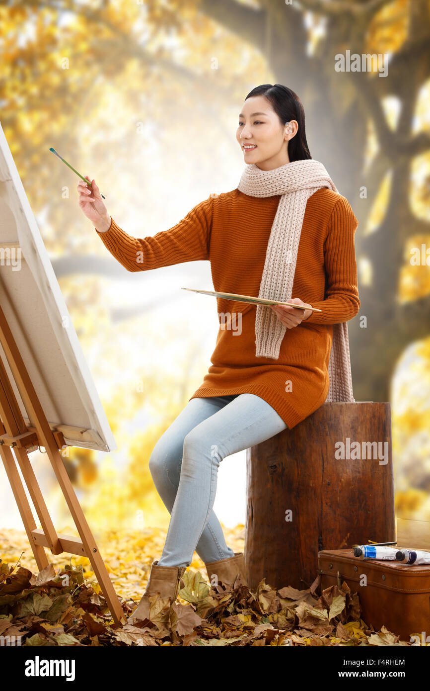 Junge Frauen outdoor Malerei Stockfoto