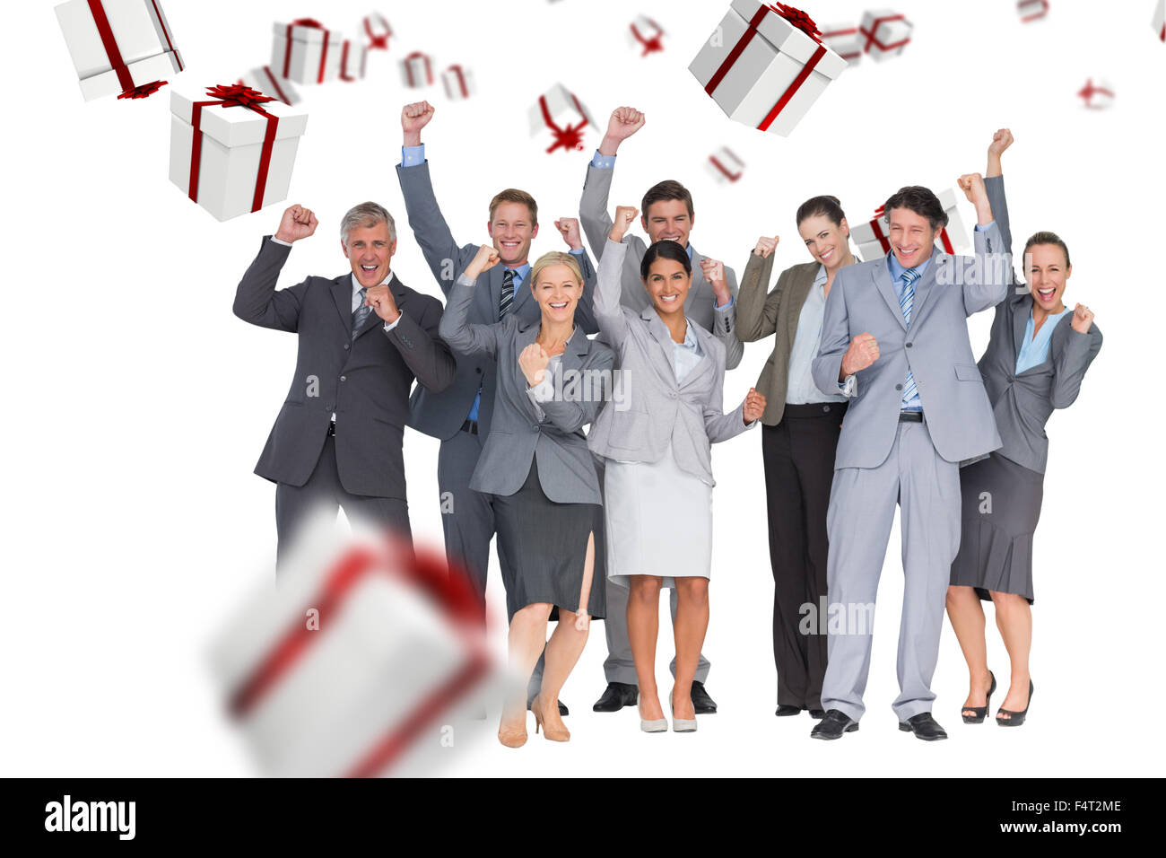 Zusammengesetztes Bild aufgeregt Business Teams jubeln in die Kamera Stockfoto