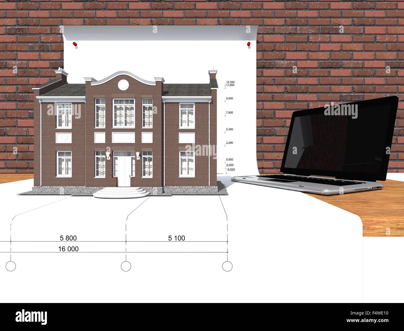 3D-Modell des Hauses und Laptop auf dem Tisch Stockfoto
