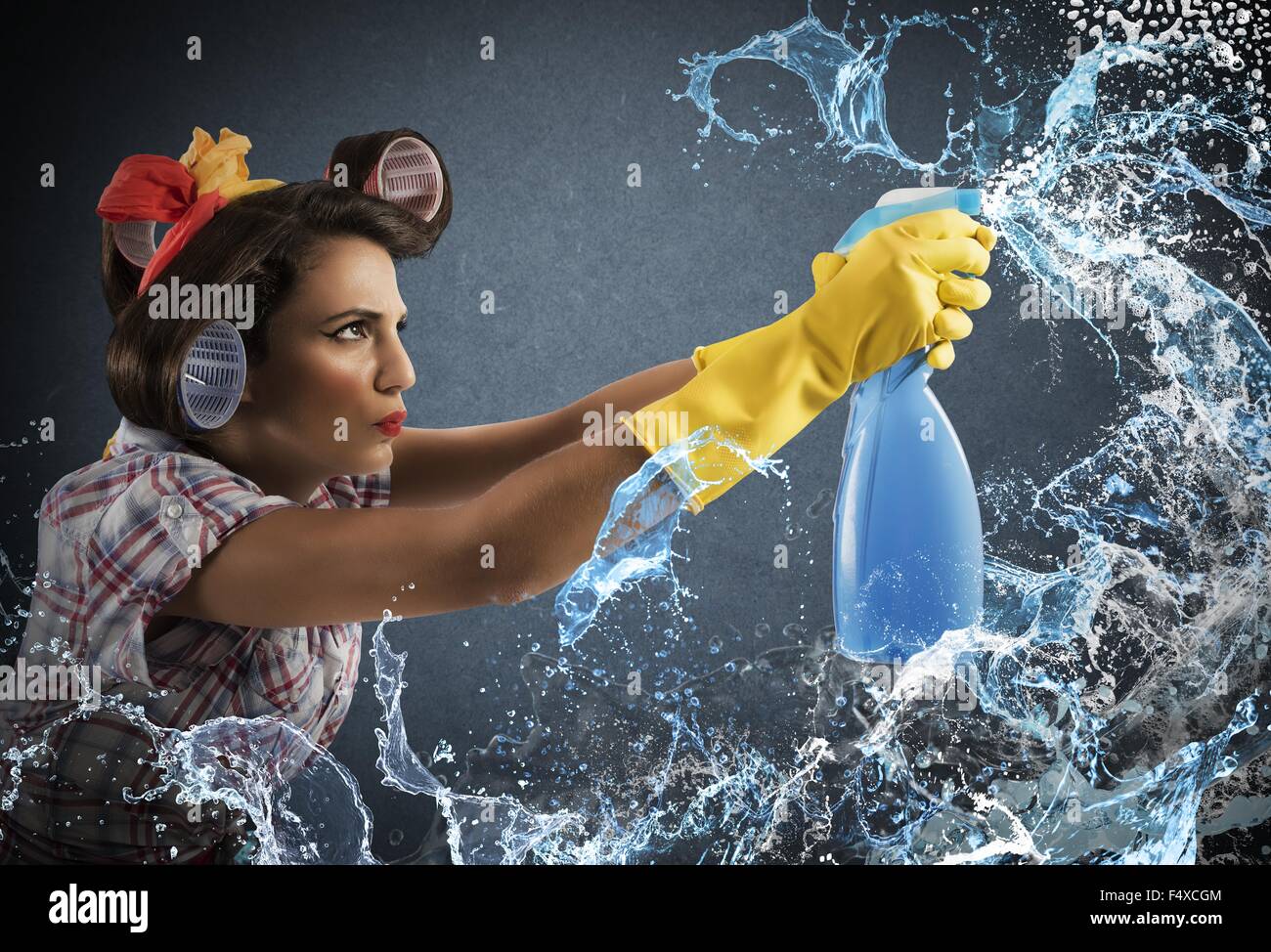 Hausfrau Reinigungsspray Stockfoto