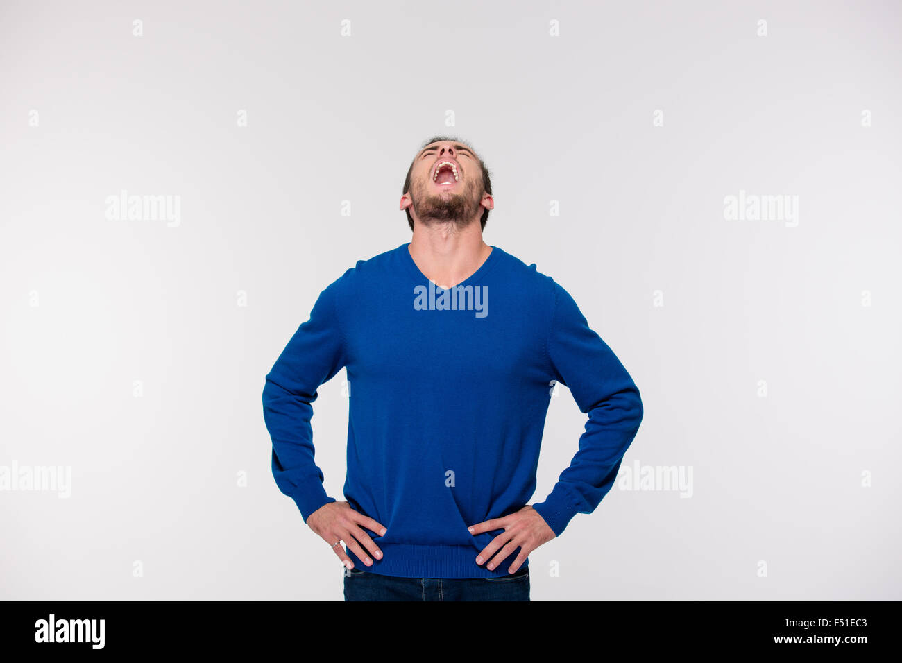 Porträt eines jungen Mannes schreien isoliert auf weißem Hintergrund Stockfoto