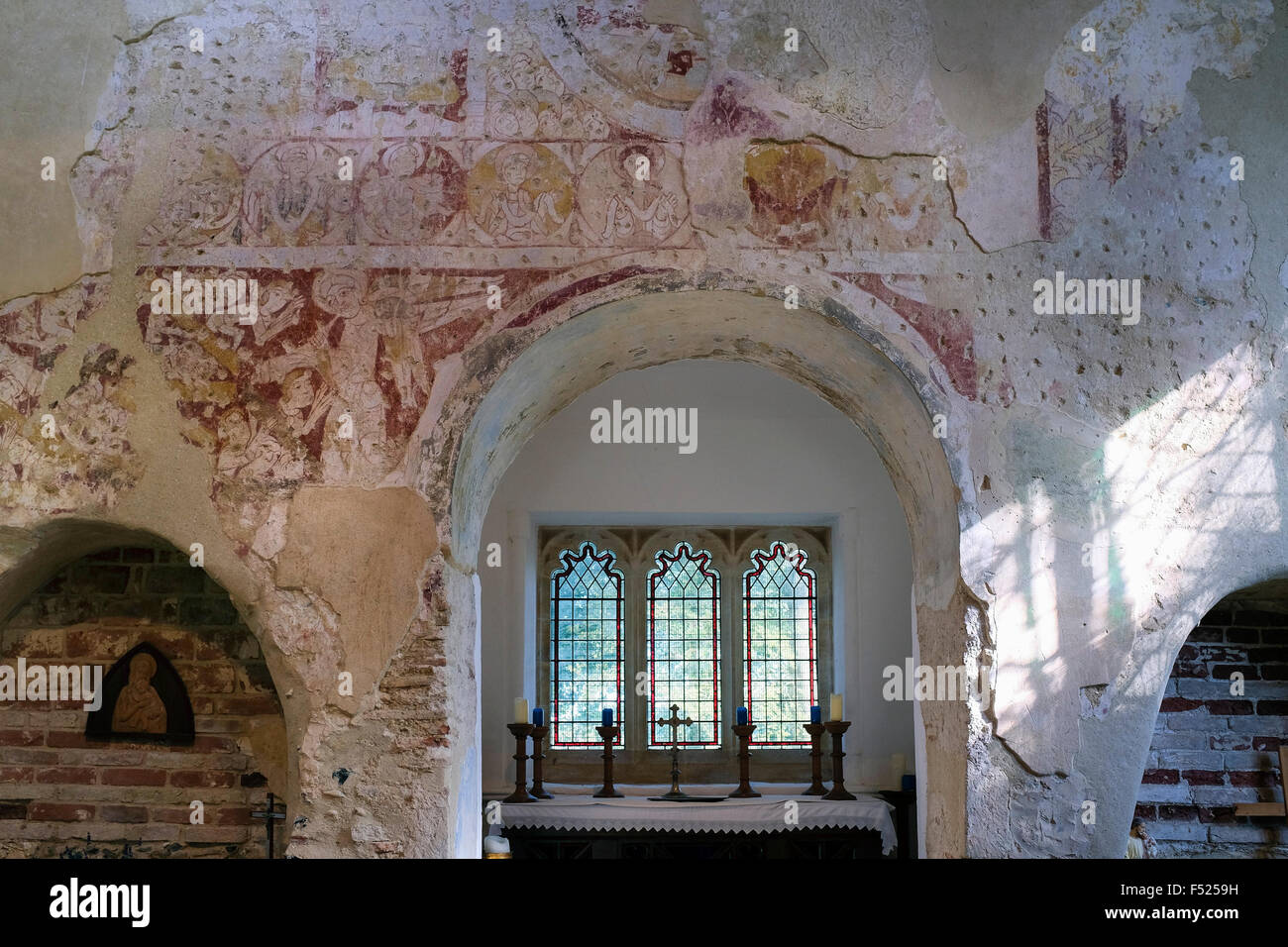 11. Jahrhundert romanischen Wandmalereien in St. Mary Parish Church, Houghton auf dem Hügel, Norfolk, Großbritannien Stockfoto