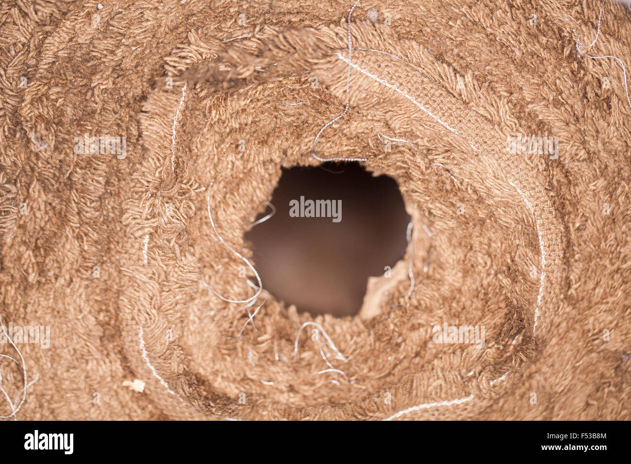 Roll-Material Stoff, hellbraune Farbe, Nahaufnahme Bild Stockfoto