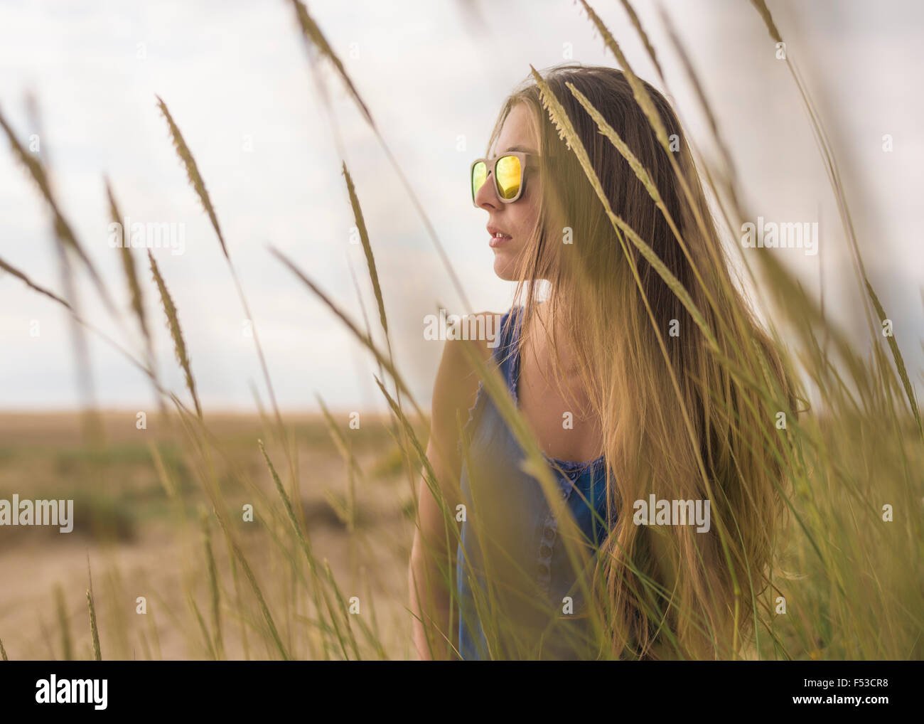 Junge Frau Gefühl blau. Stockfoto