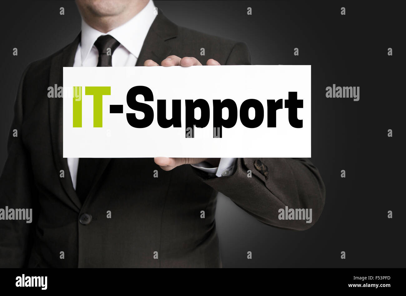 IT-Support, die Zeichen von Geschäftsmann Konzept gehalten werden. Stockfoto