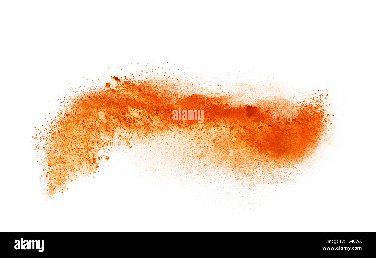 Einfrieren der Bewegung orange Staubexplosion isoliert auf weißem Hinterg Stockfoto