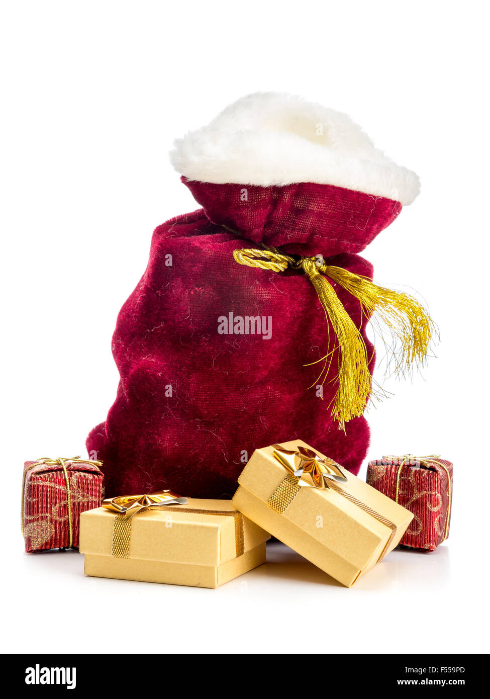 Santa Claus Tasche voller Weihnachten präsentiert auf weißem Hintergrund Stockfoto