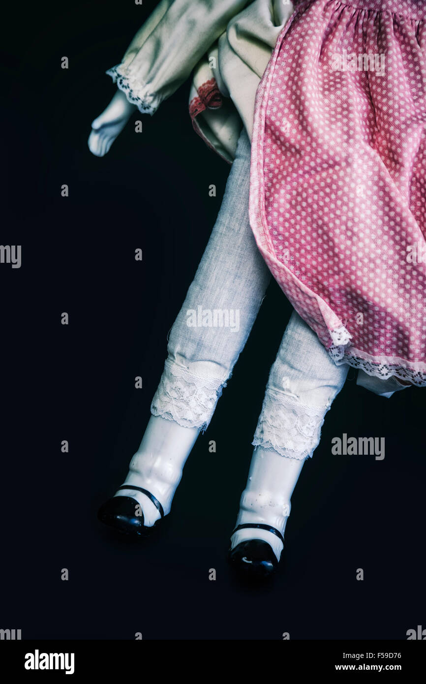 Beine einer Vintage Puppe Stockfoto