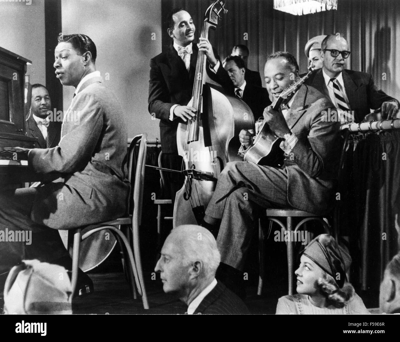 NAT KING COLE (1919-1965), US-amerikanischer Sänger und jazz-Musiker am Klavier in dem 1958 film St Louis Blues Stockfoto