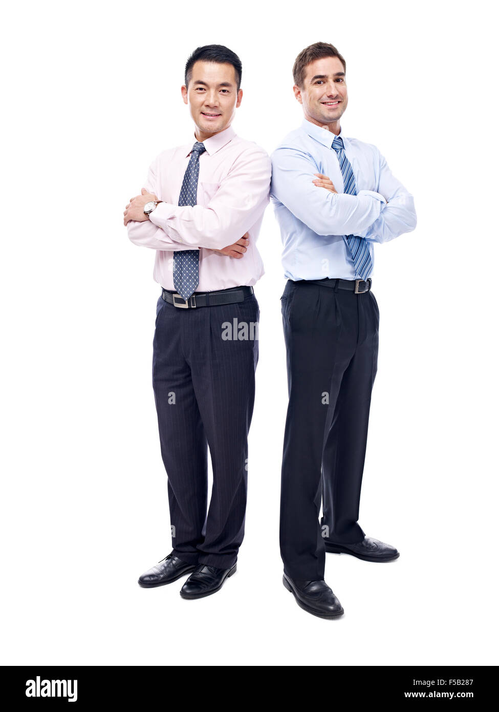Studio-Porträt der kaukasischen und asiatischen Unternehmer Stockfoto
