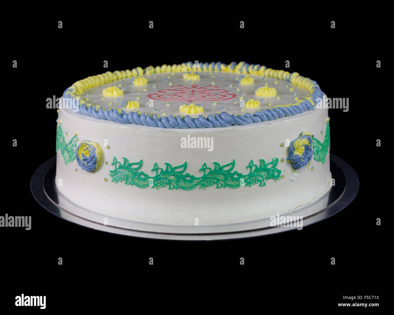 Einem weißen Kuchen mit Dekorationen in verschiedenen Farben Stockfoto