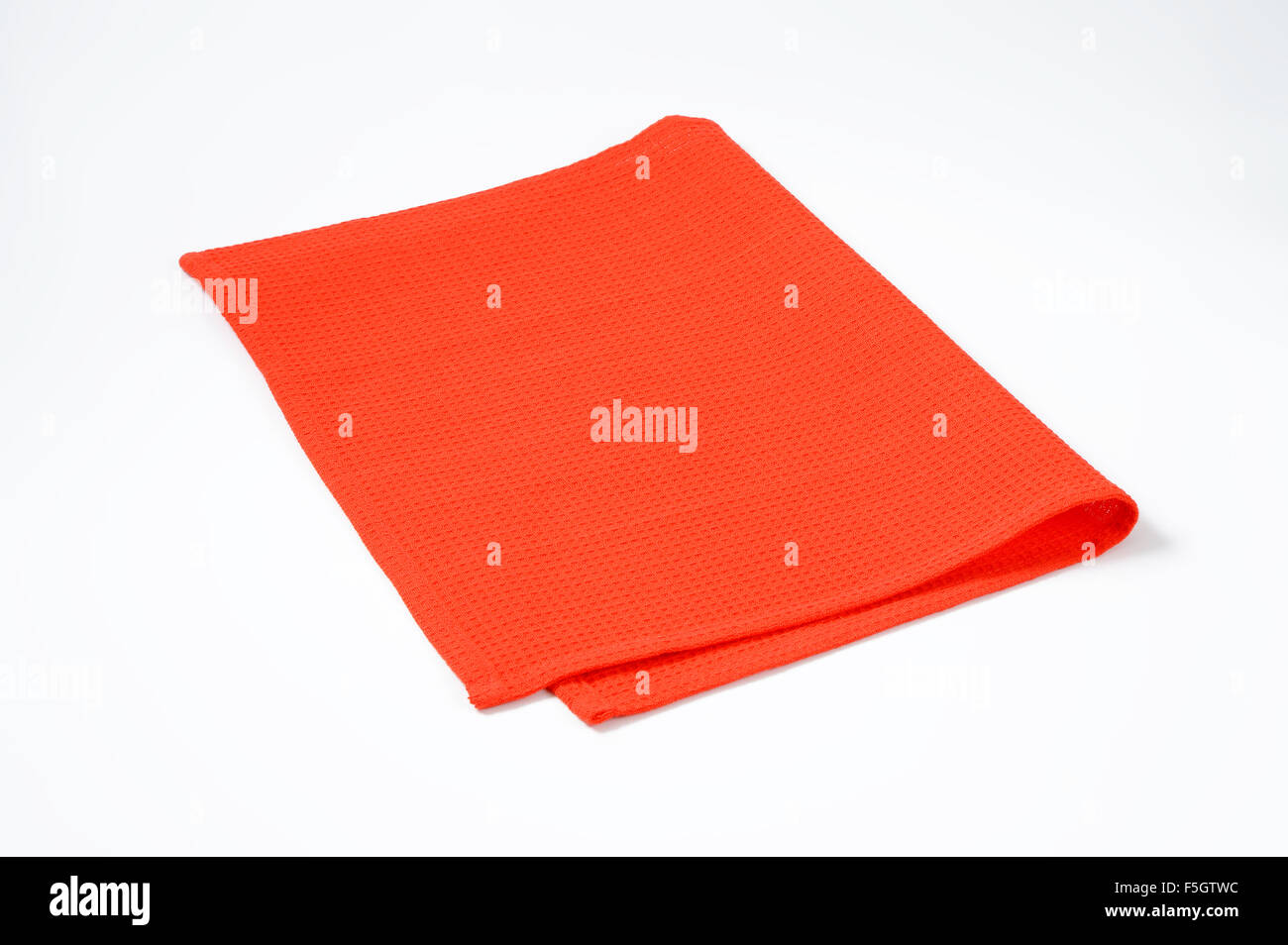 Roter Platz-Matte auf weißem Hintergrund Stockfoto