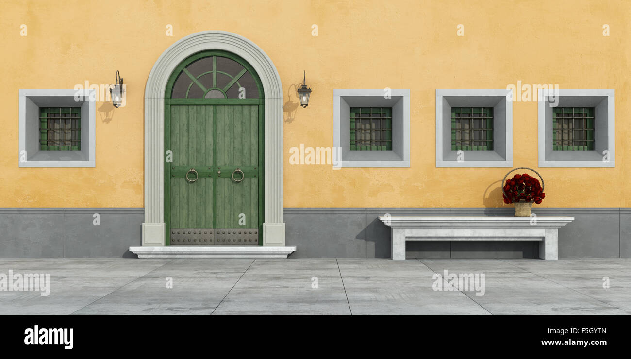 Alte Fassade mit grünen Tür, Fenstern und Steinbank - 3D Rendering Stockfoto