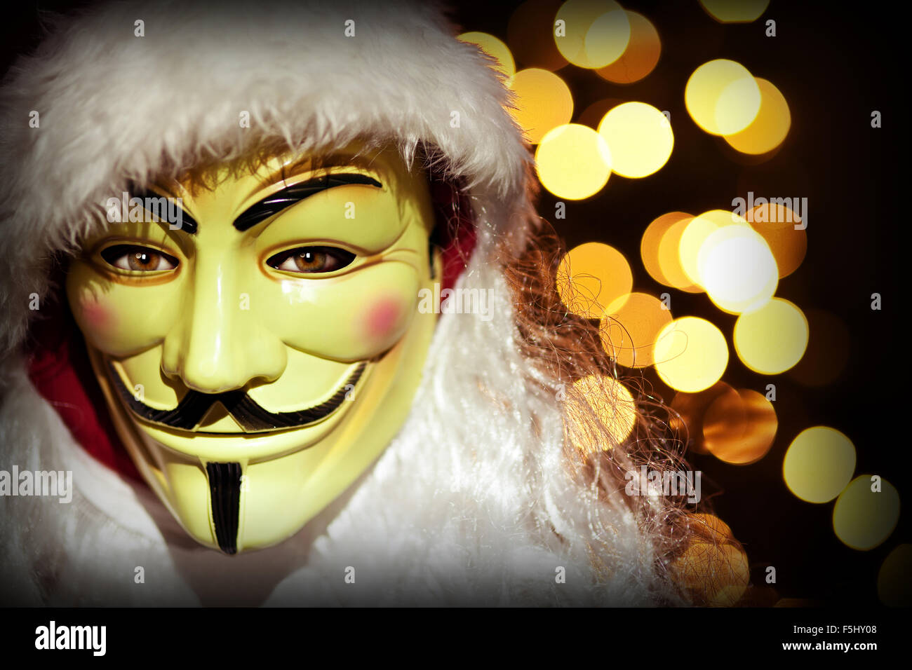 Weihnachten Bild Hacker mit Maske und Santa Kleidung Stockfoto