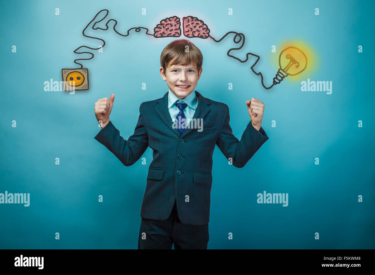 Teen junge Geschäftsmann zeigt Stärke in den Händen der chargi Stockfoto