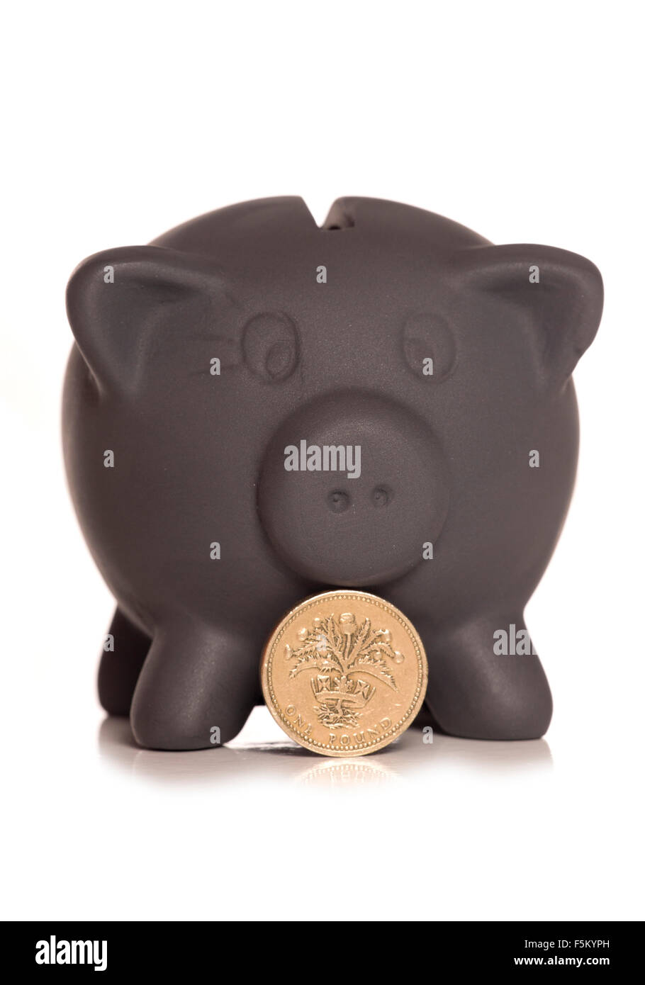 Schwarzer Freitag Piggy Sparkasse und Pfund-Münze Ausschnitt Stockfoto