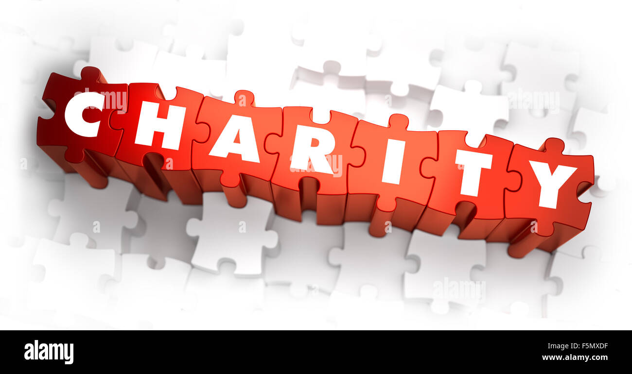 Charity - Rätsel weiß Wort auf rot. Stockfoto