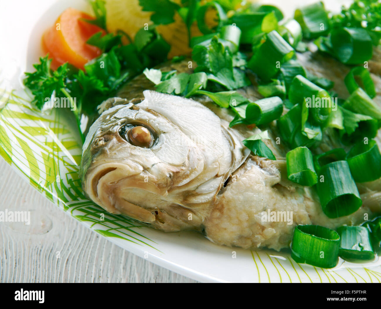 Den Kopf Fisch Auflauf - Fischgericht aus China. Stockfoto
